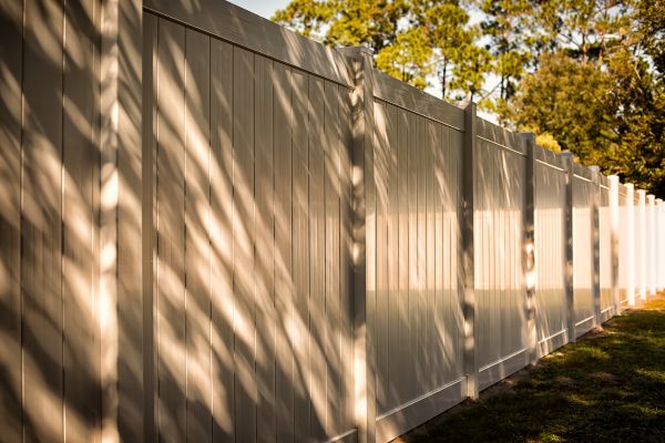 Tan Vinyl Fence Installation in Joplin