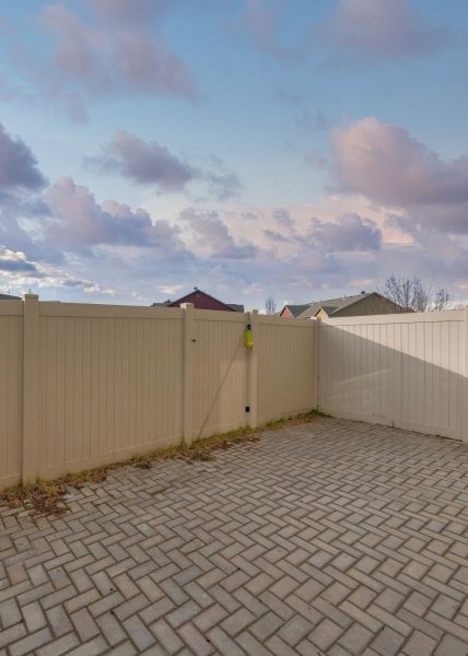 Tan PVC Fence Installation in Joplin